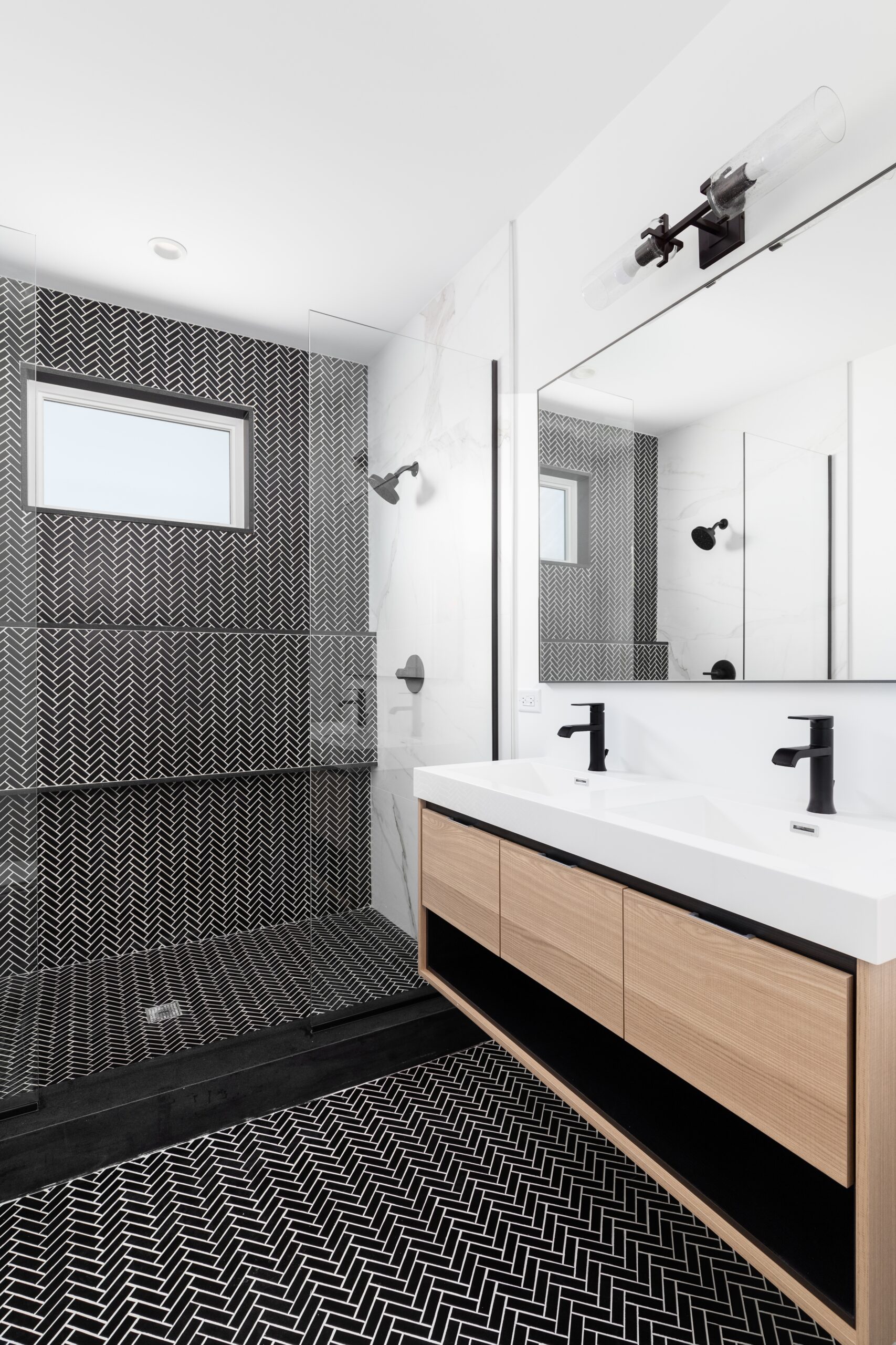 A,Beautifully,Renovated,Bathroom,With,A,Wood,Vanity,Cabinet,,Black