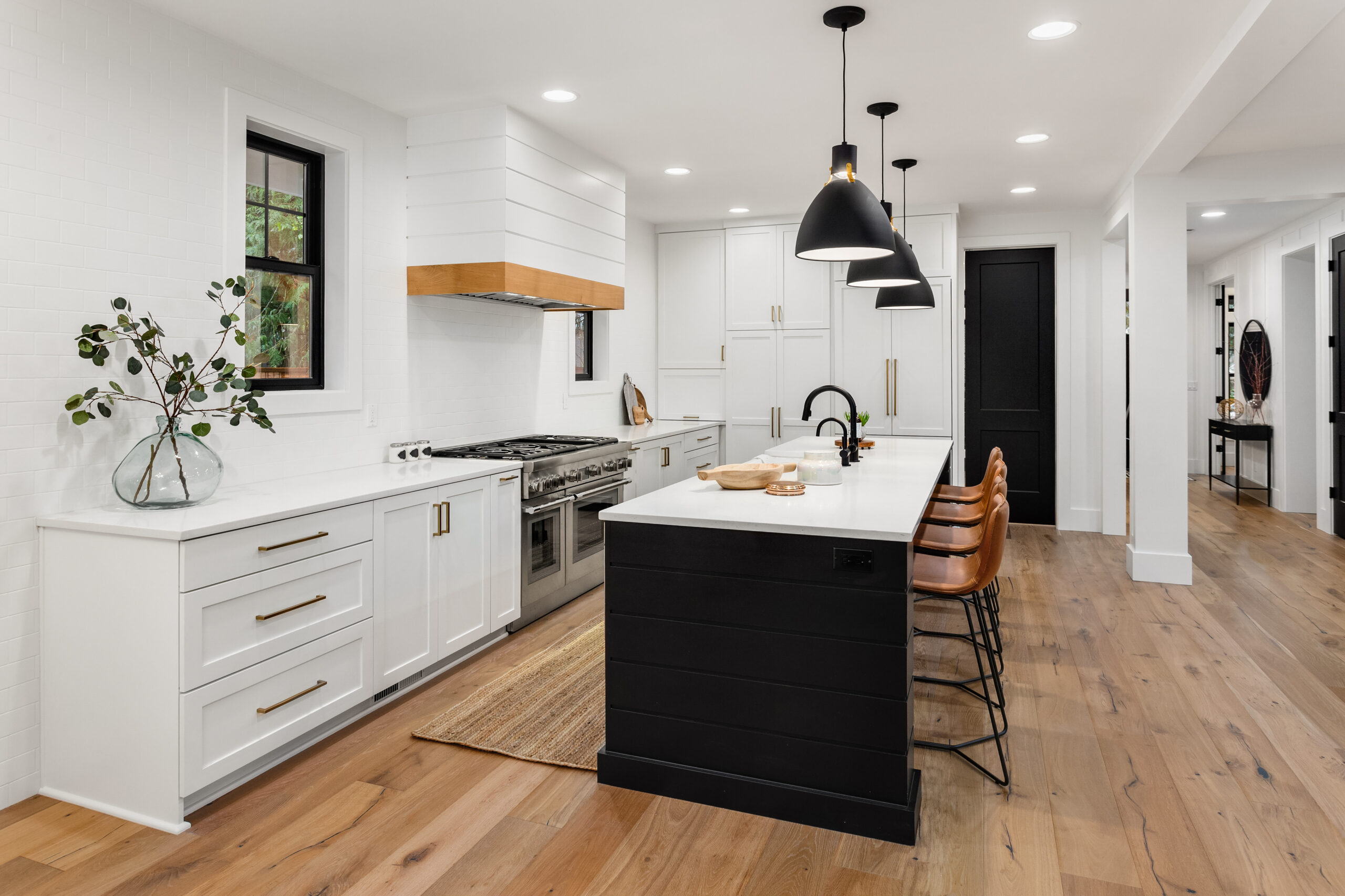 Beautiful,White,Kitchen,With,Dark,Accents,In,New,Modern,Farmhouse