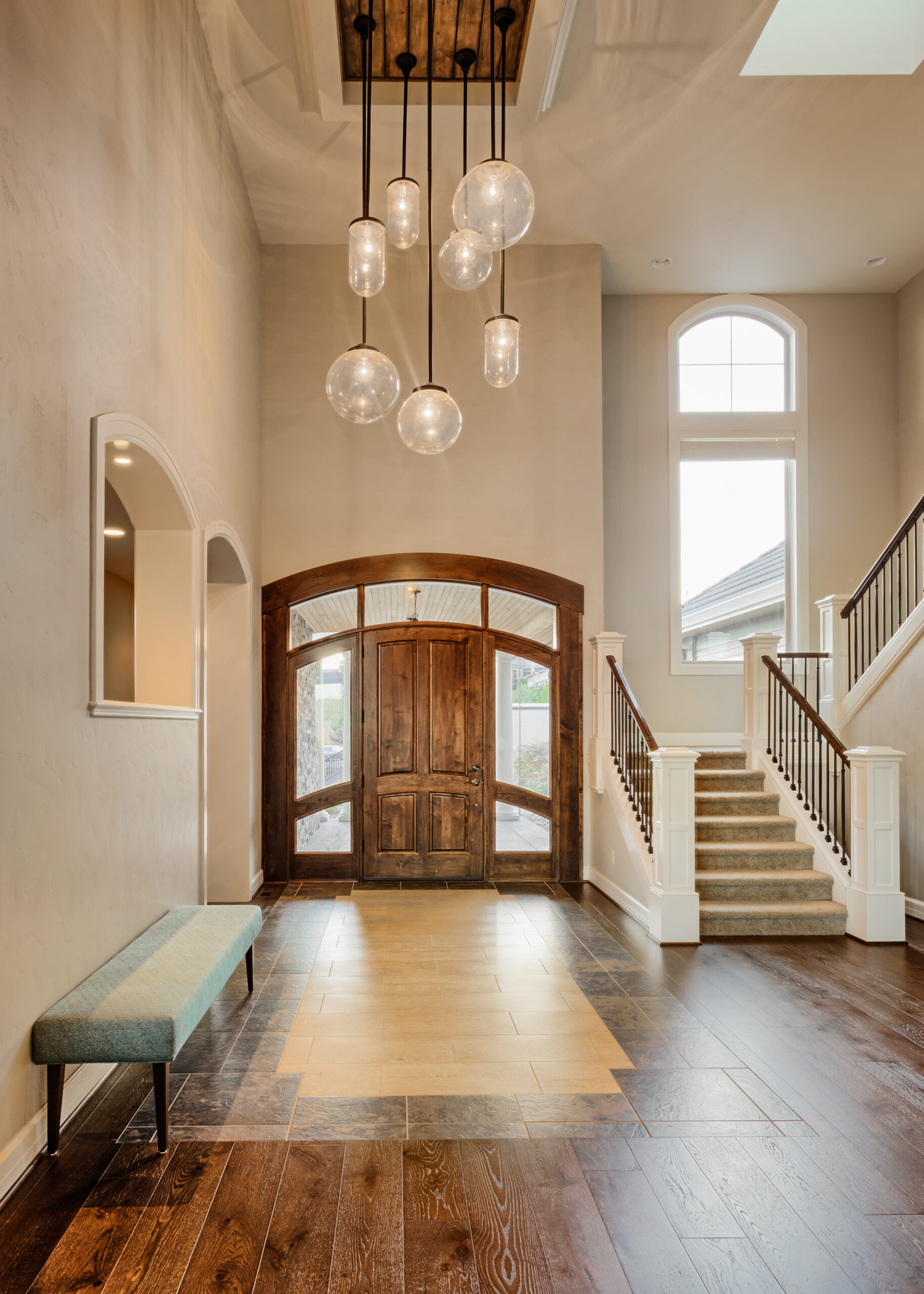 Beautiful,Foyer,In,Home;,Entryway,With,Stairs,,Pendant,Lights,,Hardwood