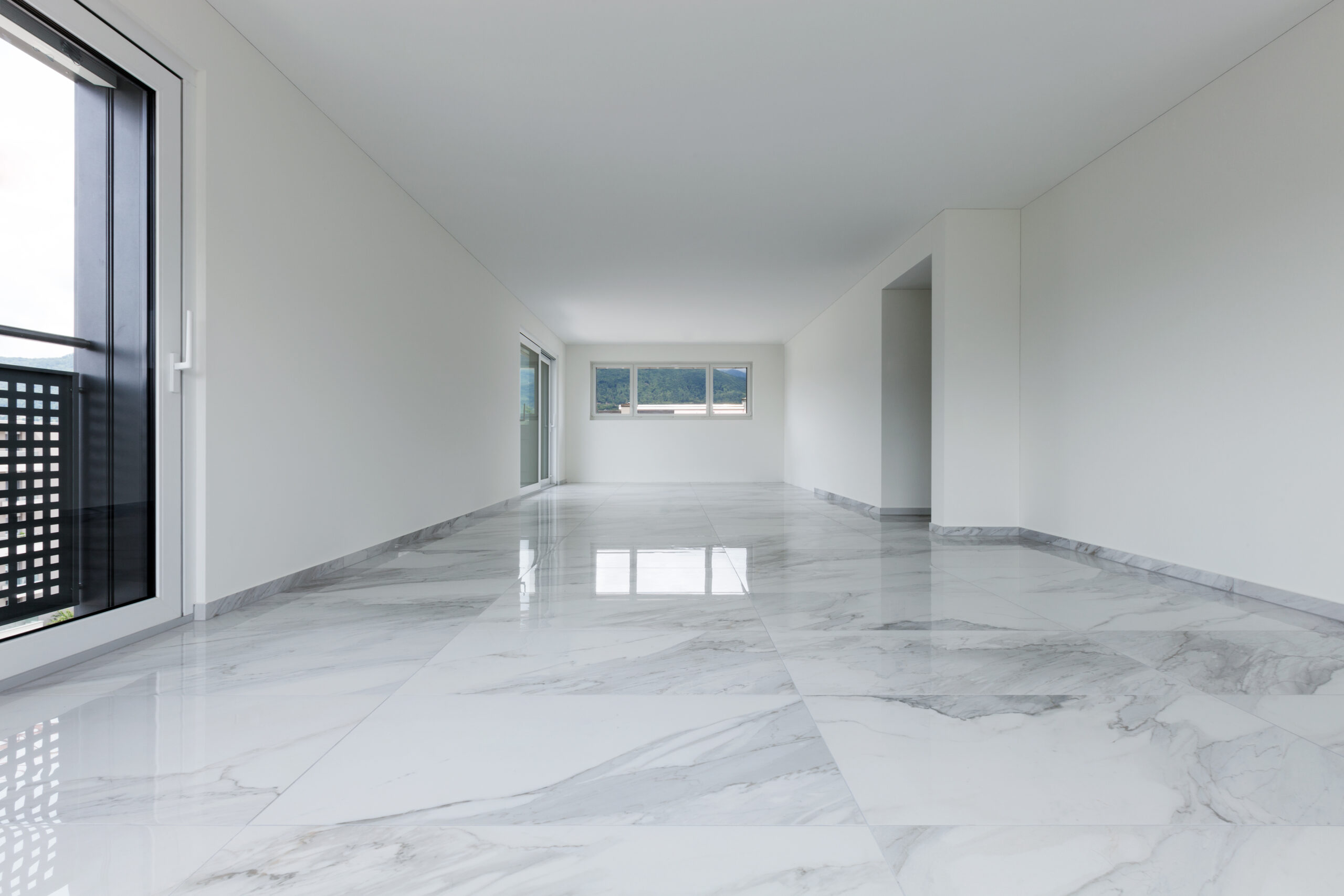 Interior,Of,Empty,Apartment,,Wide,Room,With,Marble,Floor